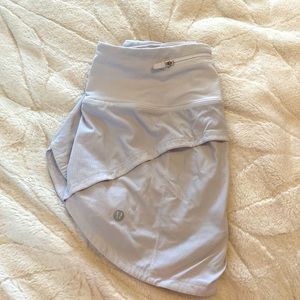 Selling used white lululemon speed ups!